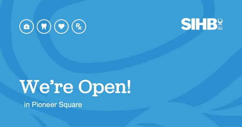 A graphic shows white text on a blue patterned background. Text reads "We're Open! in Pioneer Square."